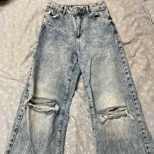 Ripped knee wide leg jeans